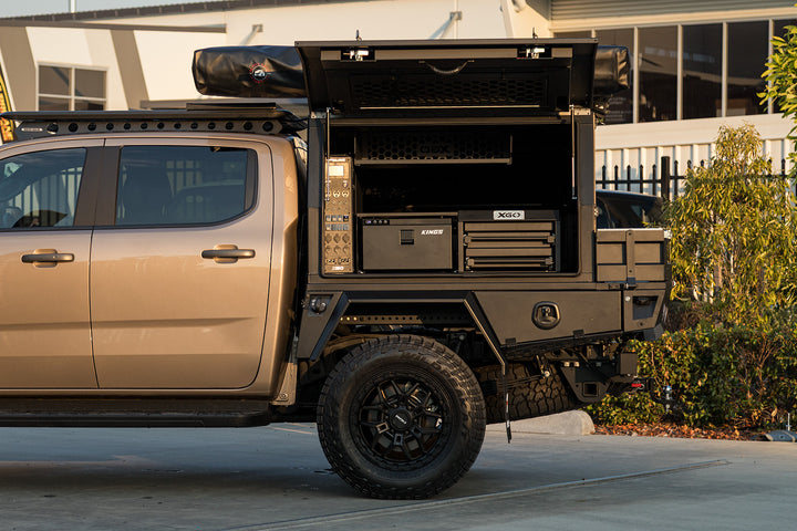 Volkswagen Amarok with an XGO chassis mount body, open on its drawers and power panel