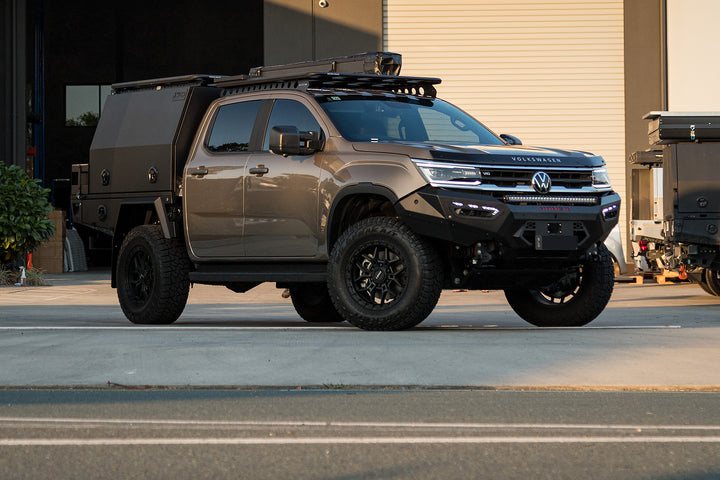 Volkswagen Amarok with an XGO chassis mount body, front three-quarter